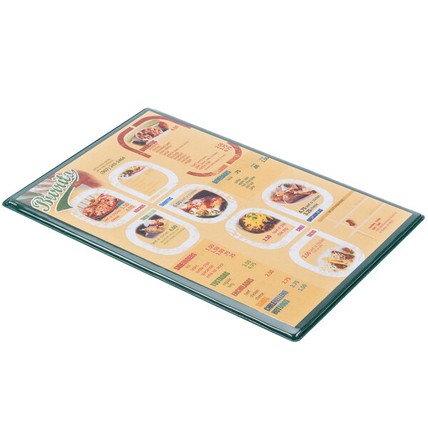 A green Hamilton menu board on a restaurant counter.