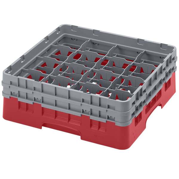 A red and grey plastic Cambro glass rack with 16 compartments.