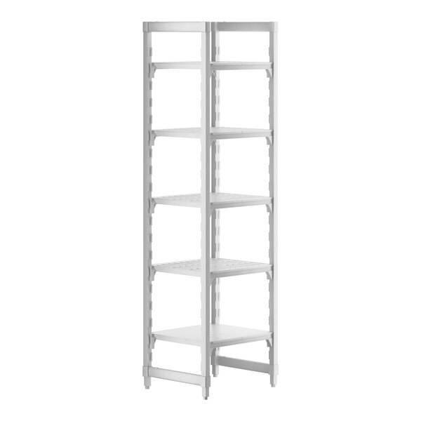A white plastic Cambro Camshelving unit with 4 vented shelves and 1 solid shelf.