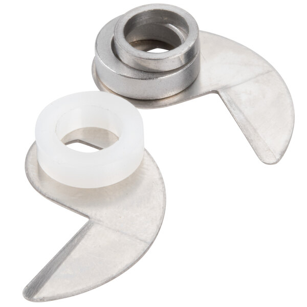 A close-up of two stainless steel rings with a white ring.