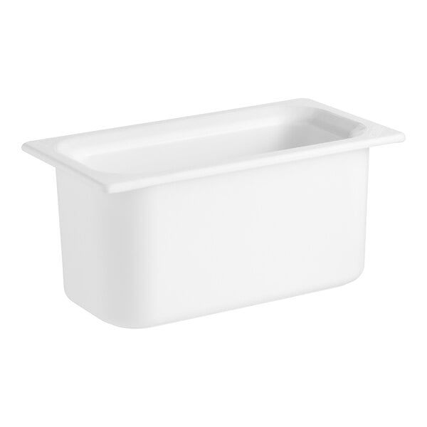 A white Carlisle Coldmaster plastic food pan with a lid.