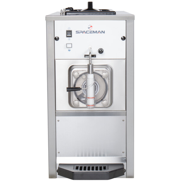 A Spaceman stainless steel frozen drink machine with a white tube and a handle.