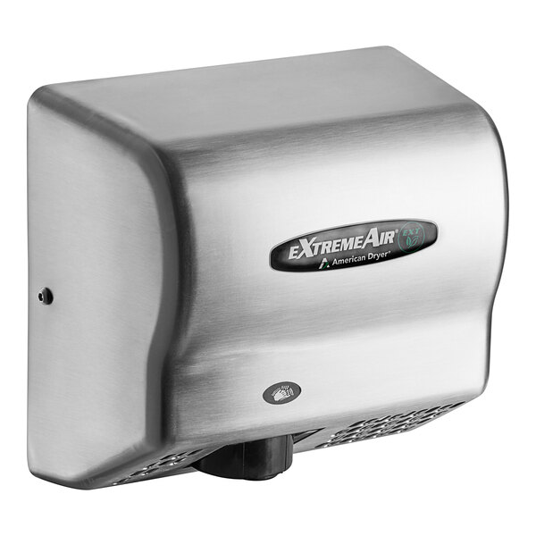 An American Dryer stainless steel hand dryer with a black and green label.