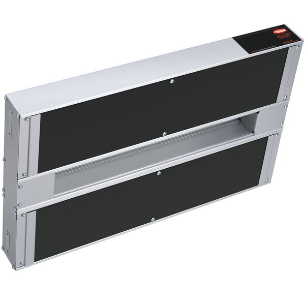 A black and silver metal Hatco Glo-Ray double strip warmer with remote controls.