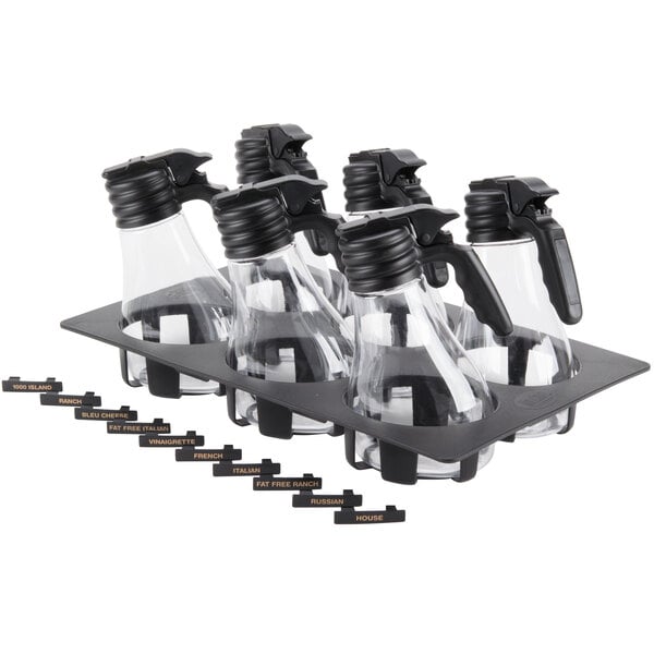 A group of Tablecraft clear plastic dispensers with black trays.