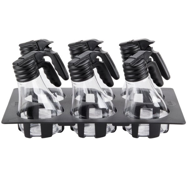 A Tablecraft Tritan dispenser set with black plastic cups and lids on a black tray.