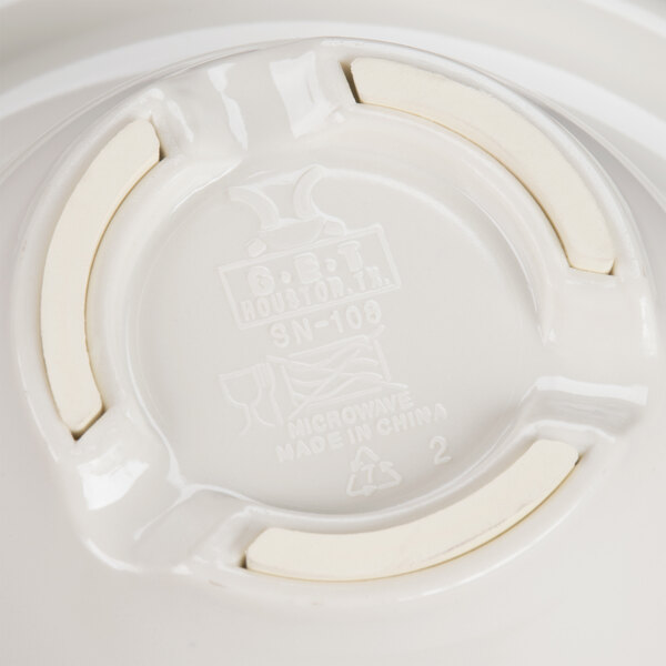 A close up of a white melamine bowl with a wide rim.