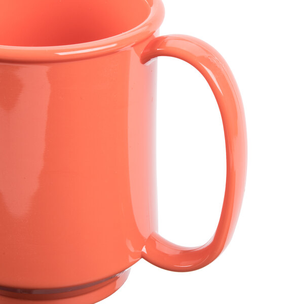 A case of 24 orange GET Rio Orange plastic two handle mugs.