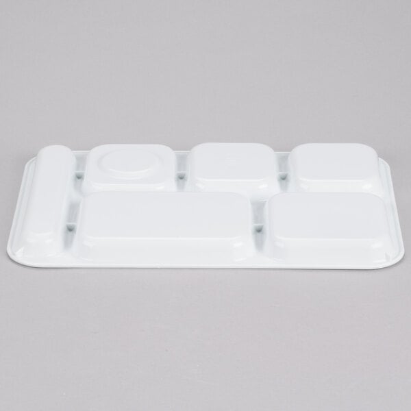 A white plastic tray with six rectangular compartments.