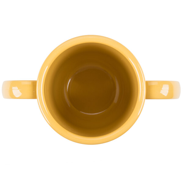 A yellow GET Tritan plastic mug with two handles.