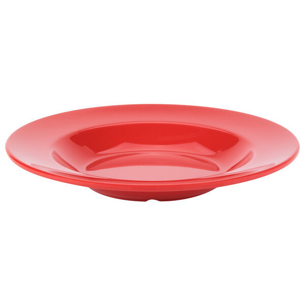 A close up of a red bowl.