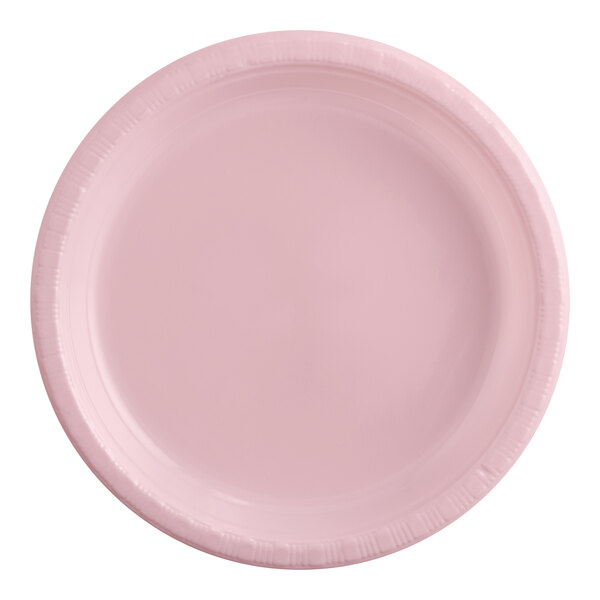 A close-up of a pink plastic plate.