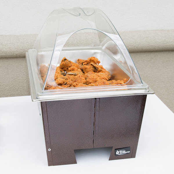 A Sterno copper vein chafing dish with food in a full size pan and clear dome cover.