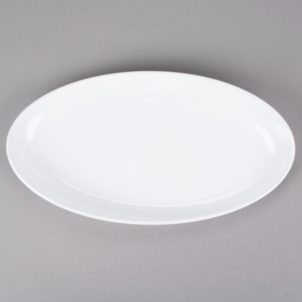 An ivory oval melamine platter with a white rim.