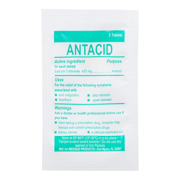 A white packet labeled 'ANTACID' containing 2 tablets, with information about active ingredients, uses, and warnings printed in green text.