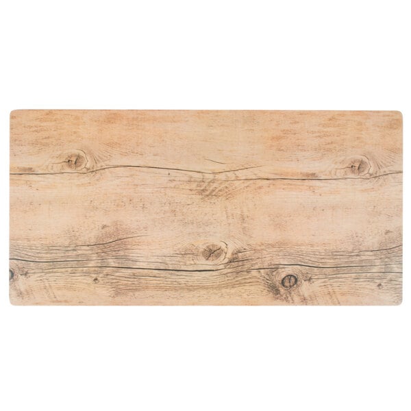 A GET Melamine faux oak wood display tray with a wood surface and knots.
