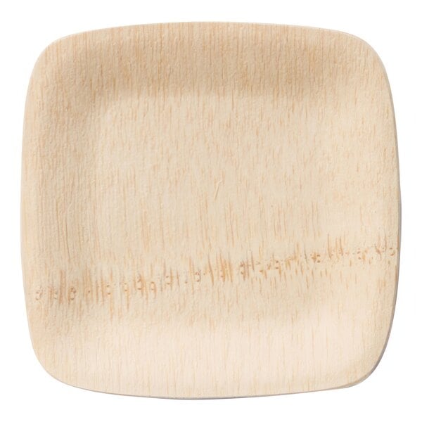 A close up of a square Bambu wooden plate with a wood grain pattern.