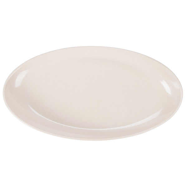 A white oval melamine platter with a white rim.