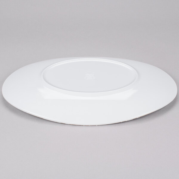 A white oval melamine platter with a circular rim.