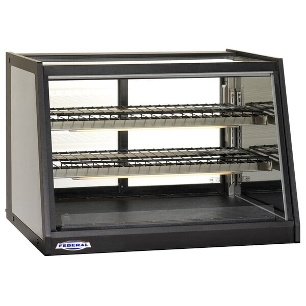 A black Federal Industries heated countertop display case with a glass door.