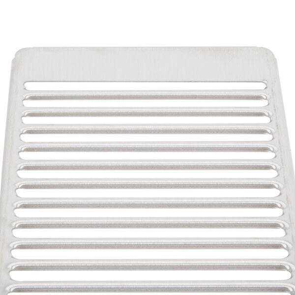 A white plastic grid tray for a beverage dispenser.