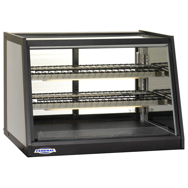 A black and silver Federal Industries heated countertop display case with a glass door.