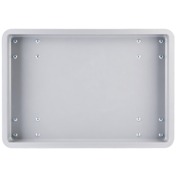 A grey rectangular fiberglass dolly with screws.