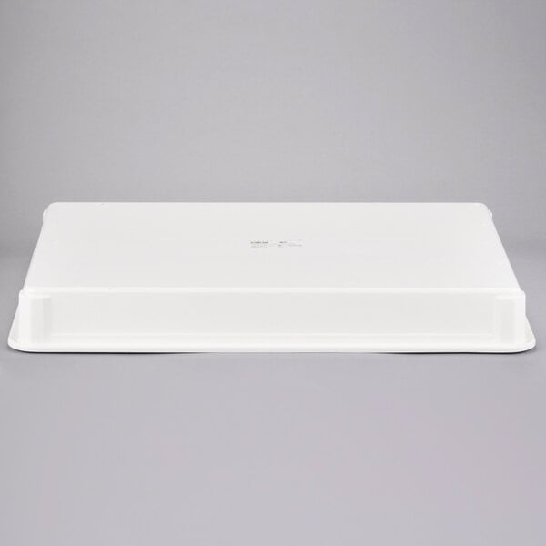A white fiberglass MFG Tray dough proofing box with a lid.