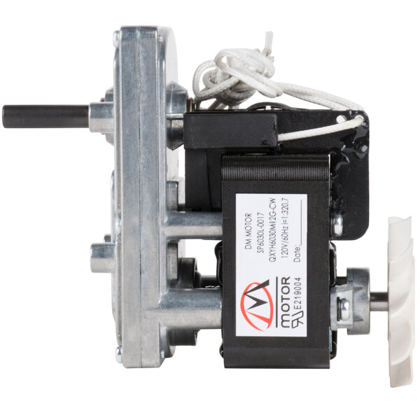 A small metal device with a white wheel.