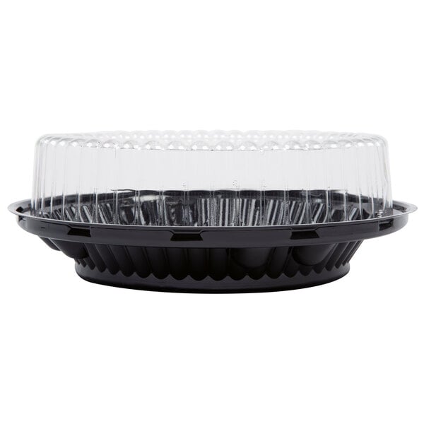 A D&W Fine Pack black plastic pie container with clear high dome lid.