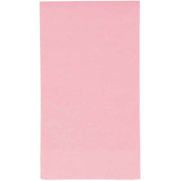 A close-up of a pink paper guest towel with a black border.