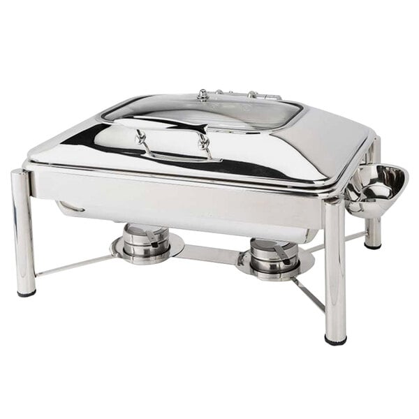 An Eastern Tabletop stainless steel rectangular chafer with a hinged glass dome cover on a silver stand.