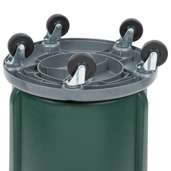 A green Rubbermaid BRUTE round trash can with wheels.