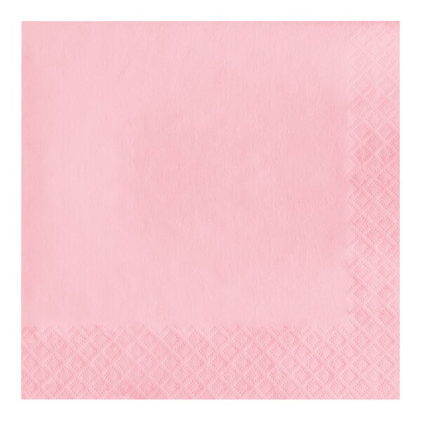 A pink napkin with a diamond pattern.