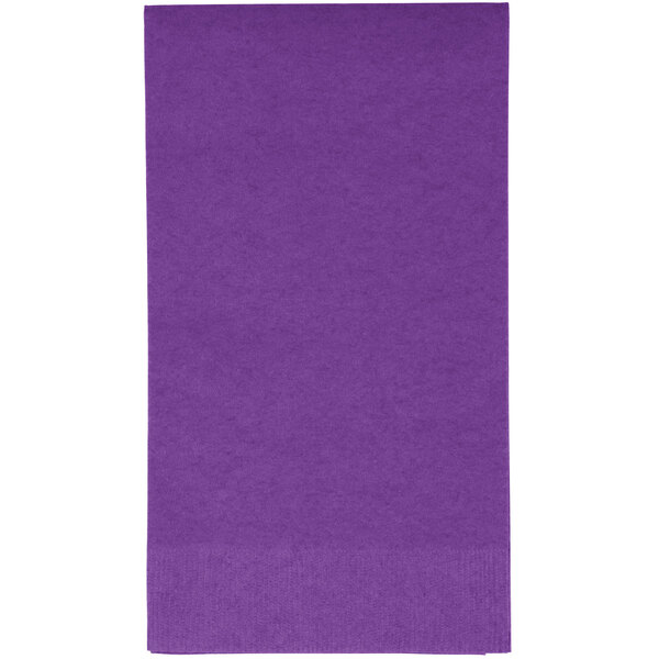 A Creative Converting amethyst purple guest towel with a white border.