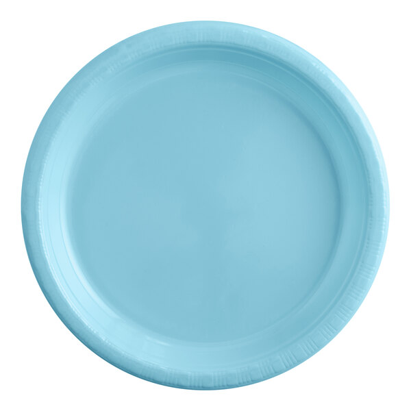 A close-up of a pastel blue plastic plate with a white circle in the middle.