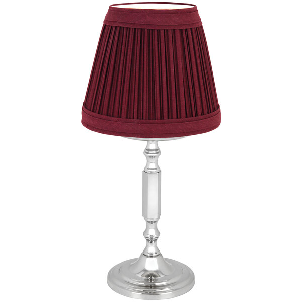 A Marlowe wine red lamp shade with pleats on a silver Sterno La Rue lamp base.