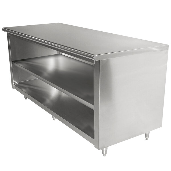 A stainless steel Advance Tabco work table with two shelves.