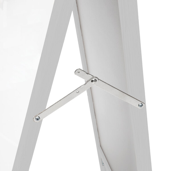 An Aarco narrow A-frame sidewalk board with a white porcelain marker board on it.
