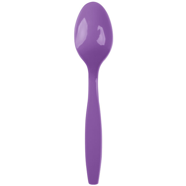 A purple plastic spoon with a white handle.