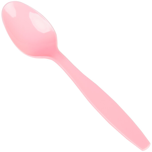 A close-up of a Creative Converting Classic Pink heavy weight plastic spoon.