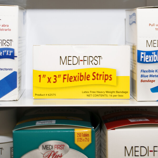 A white Medique box of woven bandage strips with a blue label.