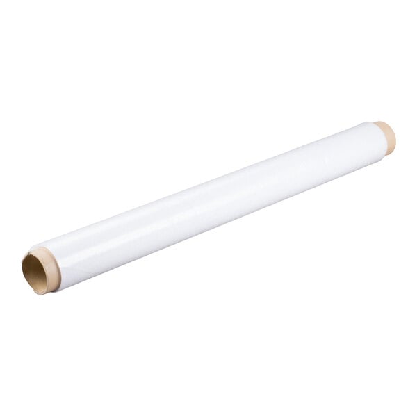 A long roll of white matting material with cardboard ends.