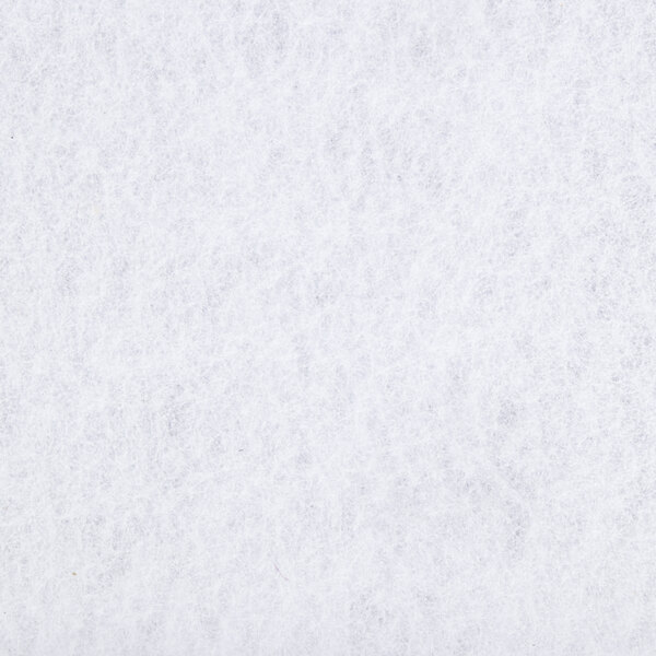 A white surface with small spots.