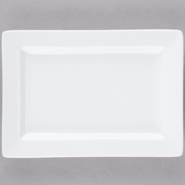 A white rectangular Libbey porcelain plate with a wide rim.