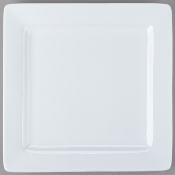 A Libbey ultra bright white square porcelain plate with a wide square rim.