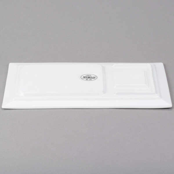 A white rectangular Libbey porcelain tray with a small compartment on top.