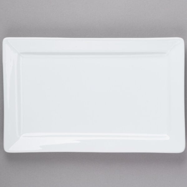 A white rectangular Libbey porcelain plate with a wide rim.