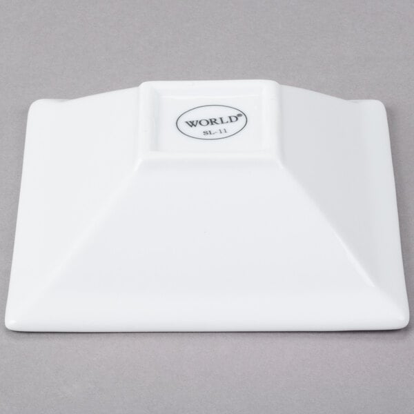 A white square Libbey porcelain bowl.