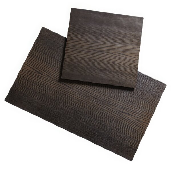 Two dark brown walnut melamine serving boards on a table.